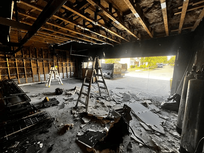 Emergency garage door restoration - severe damage repair